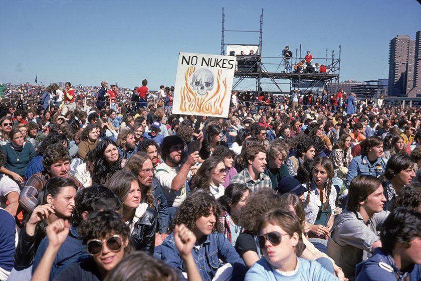Crowds gathered for a No Nukes rally protesting the development of nuclear weapons in New York City, circa 1980.